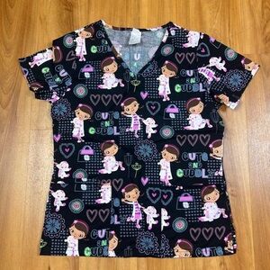 Disney Nurse uniform with print of the toy doctor neck pockets short sleeves XS
